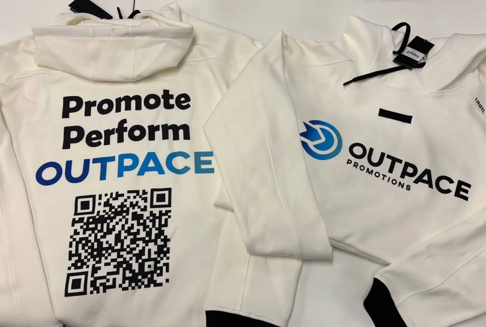 Outpace branded apparel with promotional materials